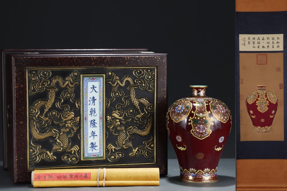 A Rare Enamel Ji Red Glazed Painted Gold Lotus and Bats Pattern Vase,With Vertical Scroll Painting: A Rare Enamel Ji Red Glazed Painted Gold Lotus and Bats Pattern Vase,With Vertical Scroll Painting on Silk,Qing Dynasty, China,Qianlong Six-character Mark,Size:11.9inx8.3in,(Without frame)25.2inx12.6i