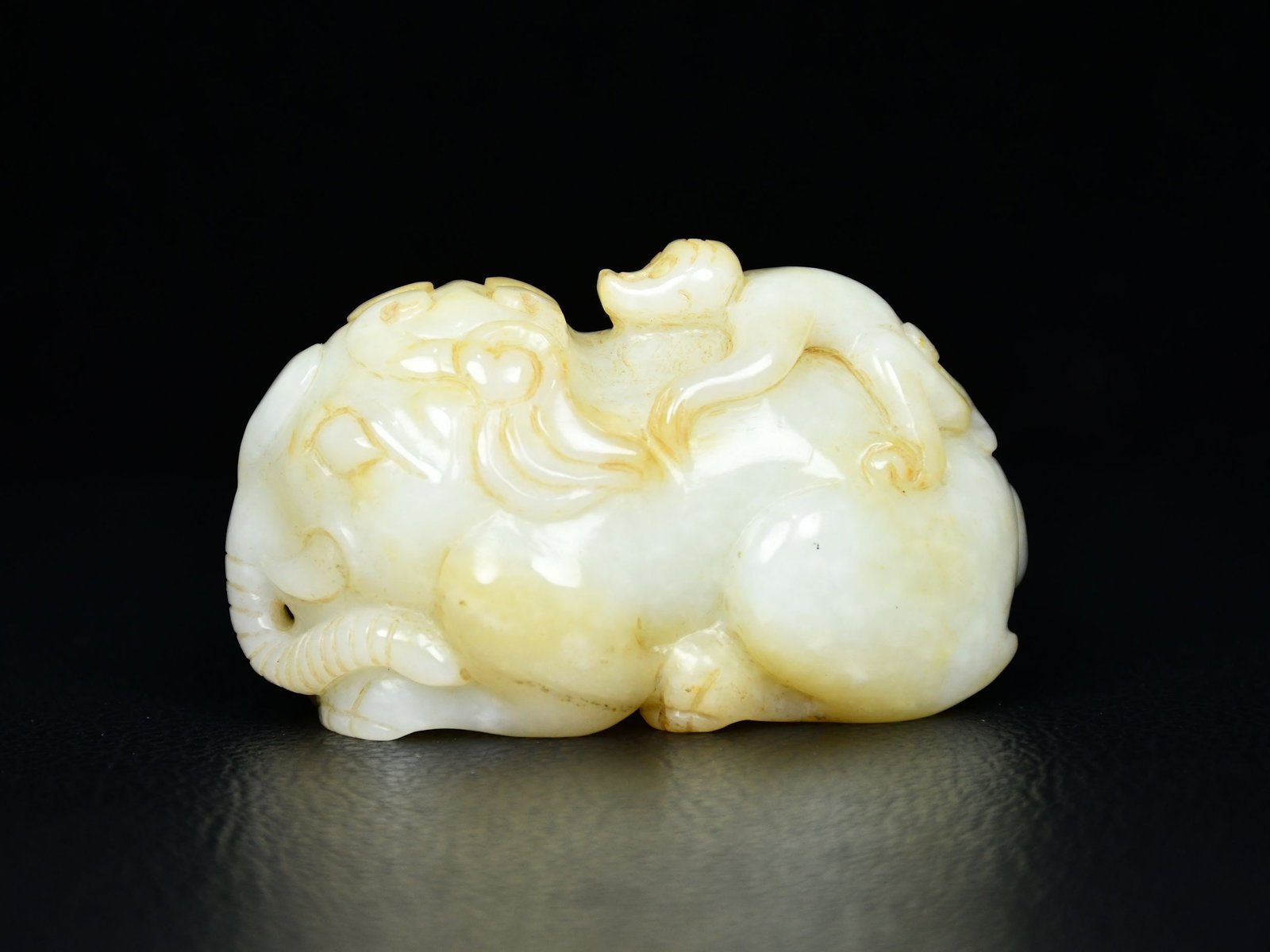An Exquisite White Jade Elephant and Monkey Hand Piece (1 of 9)