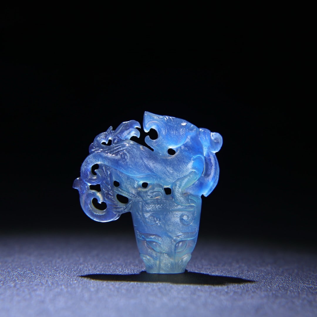 An Exquisite Aquamarine Beast-Face and Dragon Pattern Pendant: An Exquisite Aquamarine Beast-Face and Dragon Pattern Pendant,Qing Dynasty,China,Size:2inx1.9inx0.6in,Weight:30g海蓝宝兽面龙纹挂件,中国