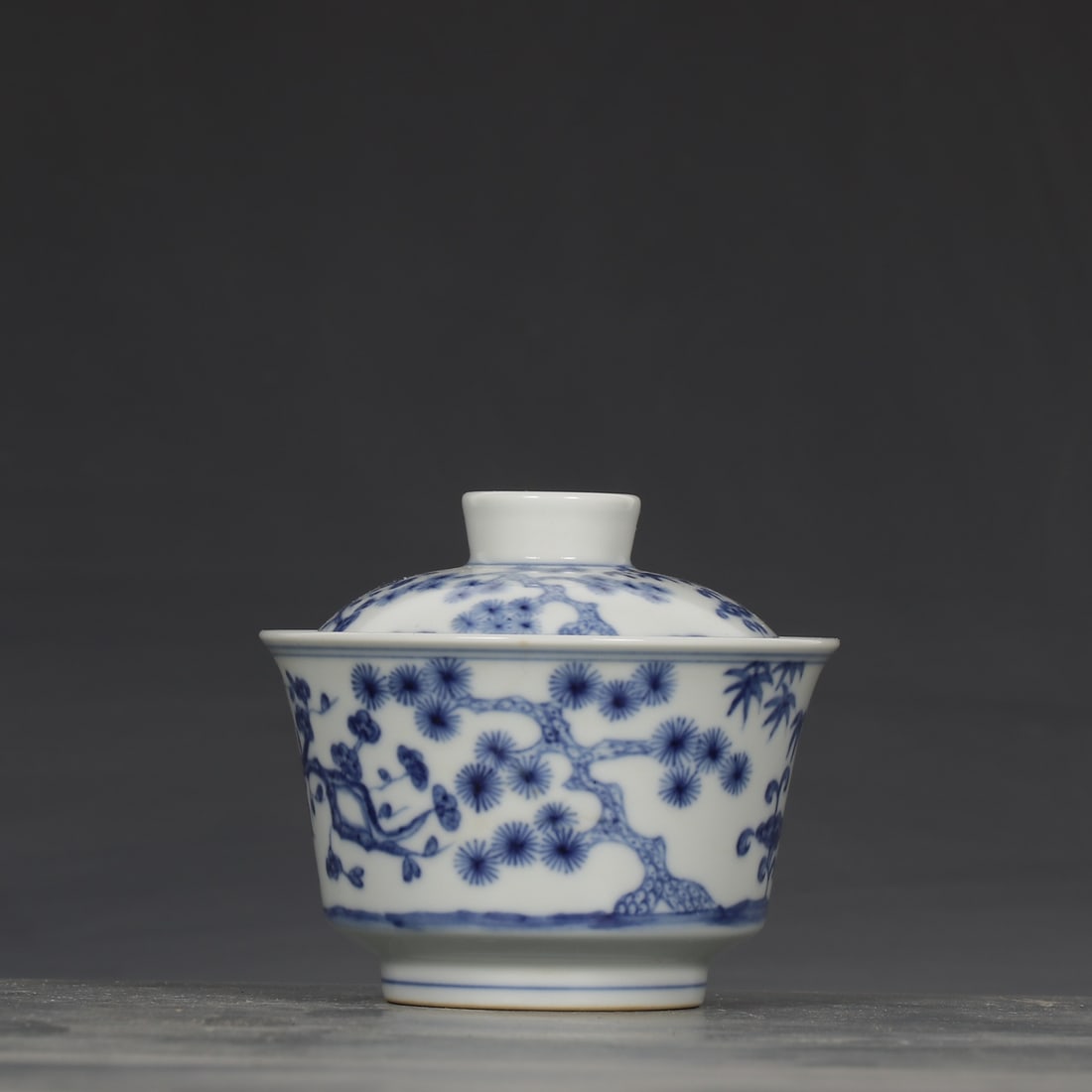 An Exquisite Blue and White Pine,Bamboo and Plum Blossom Pattern Cup: An Exquisite Blue and White Pine,Bamboo and Plum Blossom Pattern Cup,Ming Dynasty,China,Chenghua Six-character Mark,Size:3.1inx3.5in青花松竹梅纹杯,中