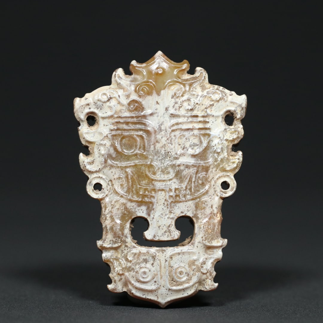 An Exquisite White Jade Beast-Face Pattern Pendant: An Exquisite White Jade Beast-Face Pattern Pendant,Qing Dynasty,China,Size:2.9inx1.9inx0.4in,Weight:55.3g白玉兽面纹挂件,中国清代,Size: