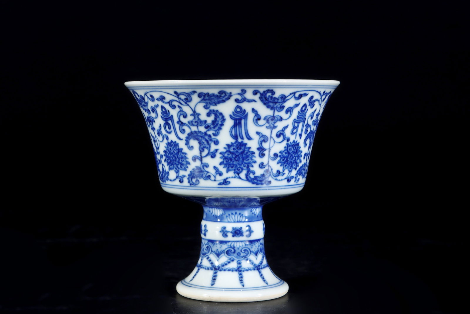 An Exquisite Blue and White Lotus Pattern Stem Bowl,With Sanskrit: An Exquisite Blue and White Lotus Pattern Stem Bowl,With Sanskrit,Qing Dynasty, China,Qianlong Six-character