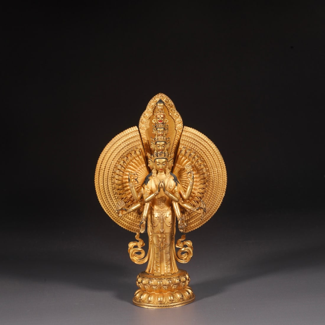 A Solemn Gilt Bronze Statue of Thousand-hand Guanyin: A Solemn Gilt Bronze Statue of Thousand-hand Guanyin,Ming