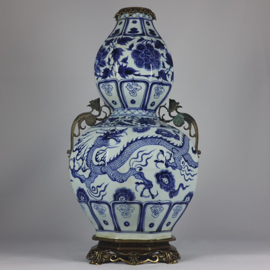 An Exquisite Blue and White Dragon Pattern Copper-Inlaid Double-Ears Gourd Vase: An Exquisite Blue and White Dragon Pattern Copper-Inlaid Double-Ears Gourd Vase,Yuan Dynasty, China,Size:22inx3.9inx11.4inx7.9in
