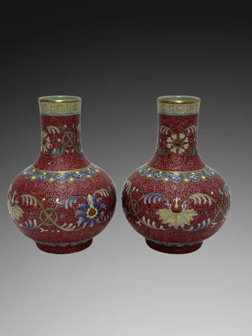 A pair of Exquisite Famille-Rose Red Ground Flower Pattern Vases: A pair of Exquisite Famille-Rose Red Ground Flower Pattern Vases,Qing Dynasty, China,Qianlong Six-character Mark,Size:4.9in
