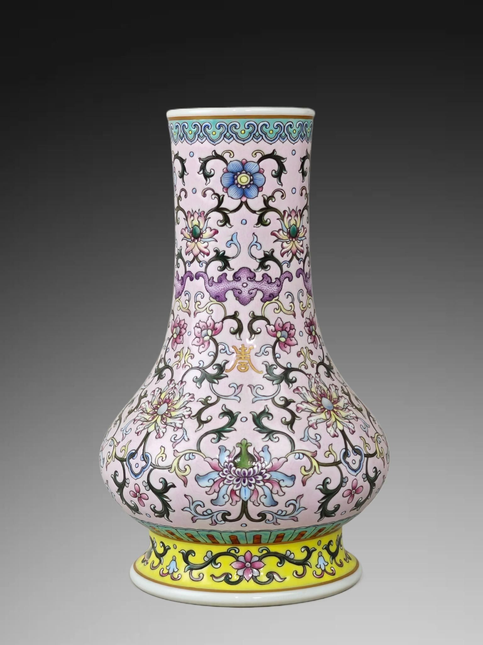 An Exquisite Famille-Rose Lotus Pattern Vase: An Exquisite Famille-Rose Lotus Pattern Vase,Qing Dynasty, China,Yongzheng Six-character Mark,Size:8.3inx5.5in