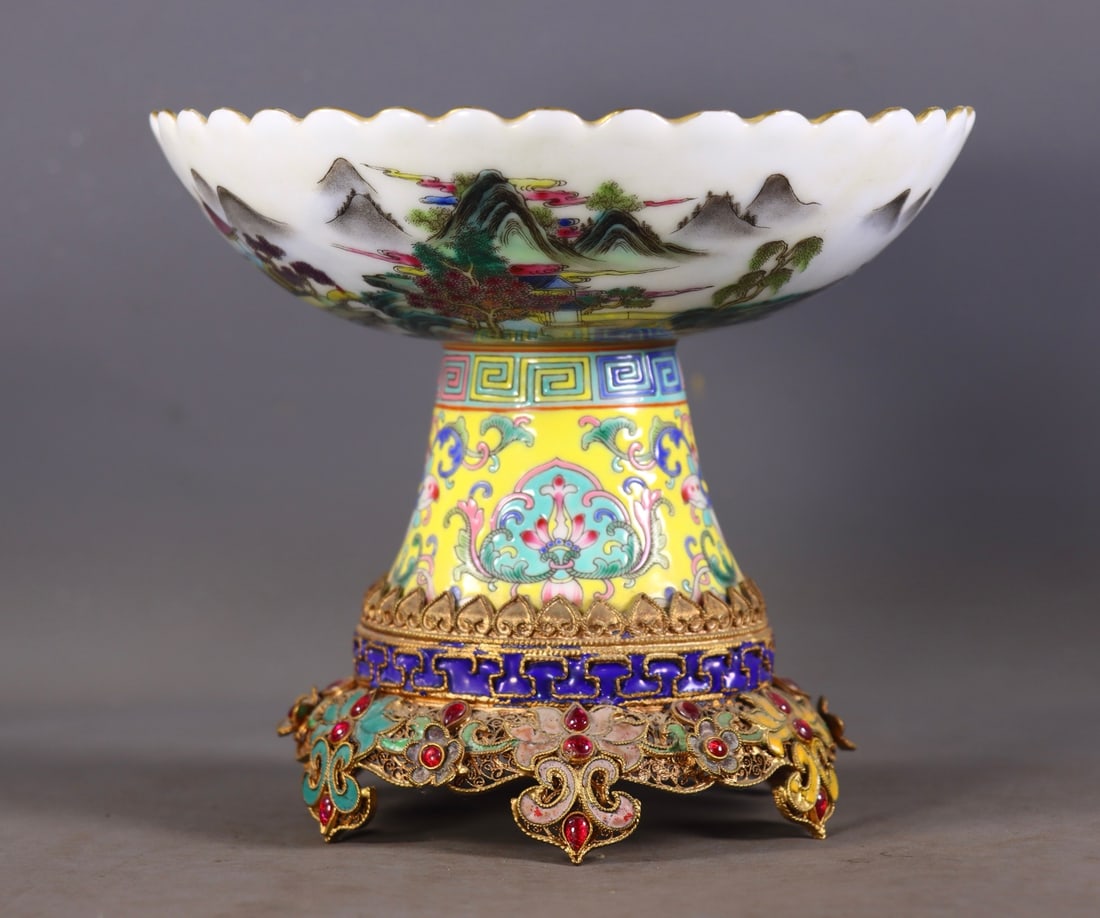 An Exquisite Filigree Gilt Inlaid Famille-Rose Yellow Ground Landscape Pattern Plate: An Exquisite Filigree Gilt Inlaid Famille-Rose Yellow Ground Landscape Pattern Plate,Qing Dynasty, China,Size:9.8in(Height),6.5in(MouthDiameter),Weight:647g 花丝鎏金镶