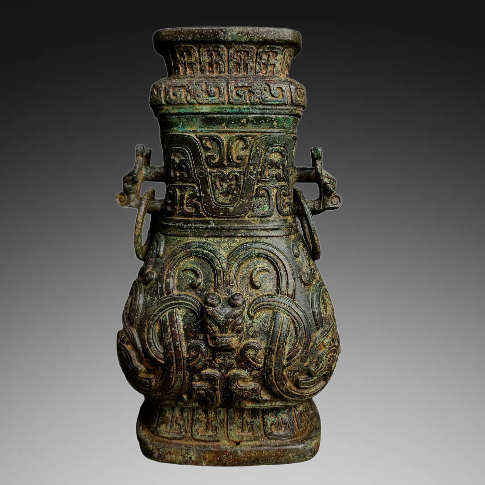 An Exquisite Bronze Dragon-Ears Vase: An Exquisite Bronze Dragon-Ears Vase,Ancient Time, China,Size:7.9inx4.3in ,Weight:1400g 青铜龙耳瓶,远古时期