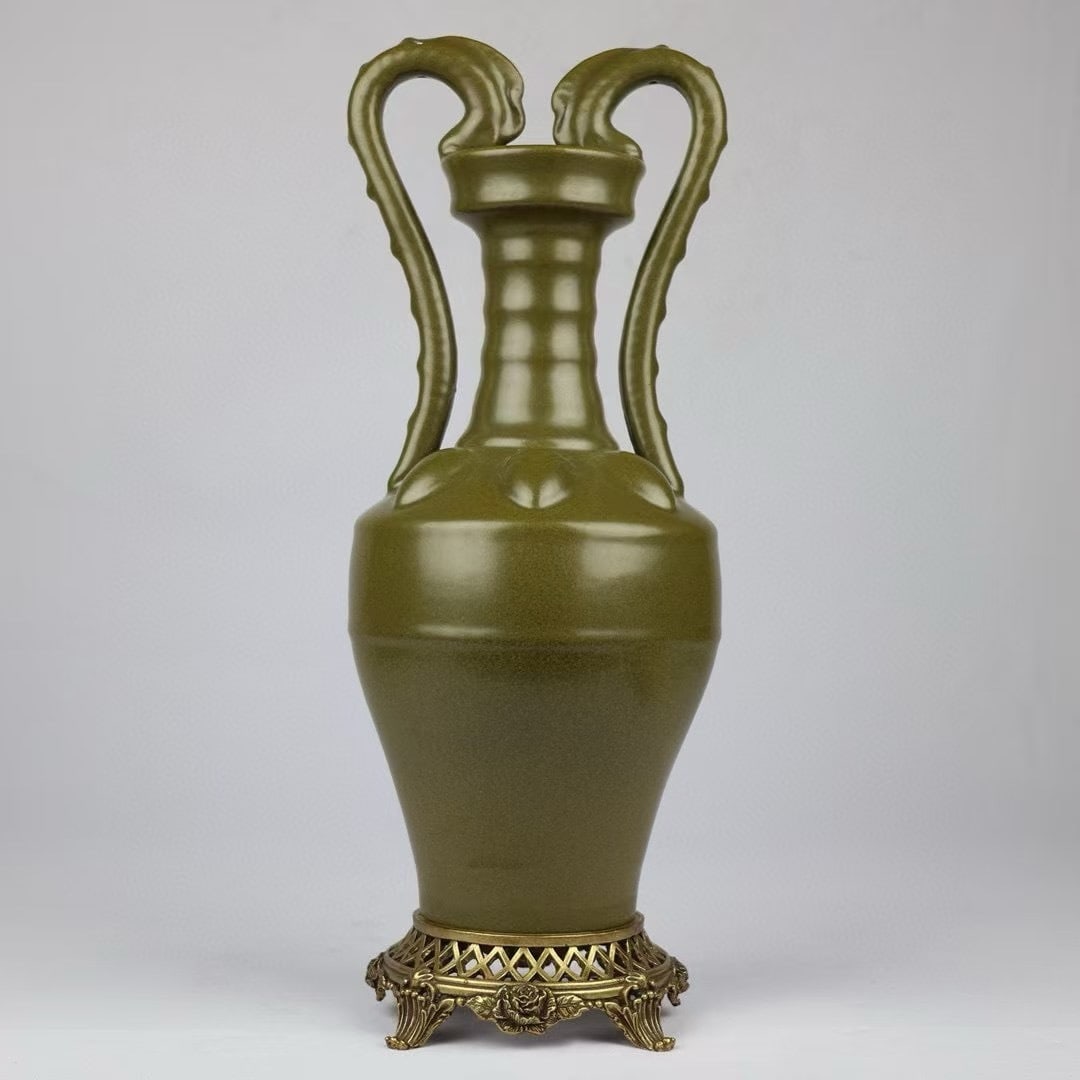 An Exquisite Teadust Glazed Copper-Inlaid Dragon-Ears Vase: An Exquisite Teadust Glazed Copper-Inlaid Dragon-Ears Vase,Qing Dynasty, China,Qianlong Six-character Mark,Size:17.3inx3.5inx6.3inx5.7in 茶叶末釉镶铜龙耳