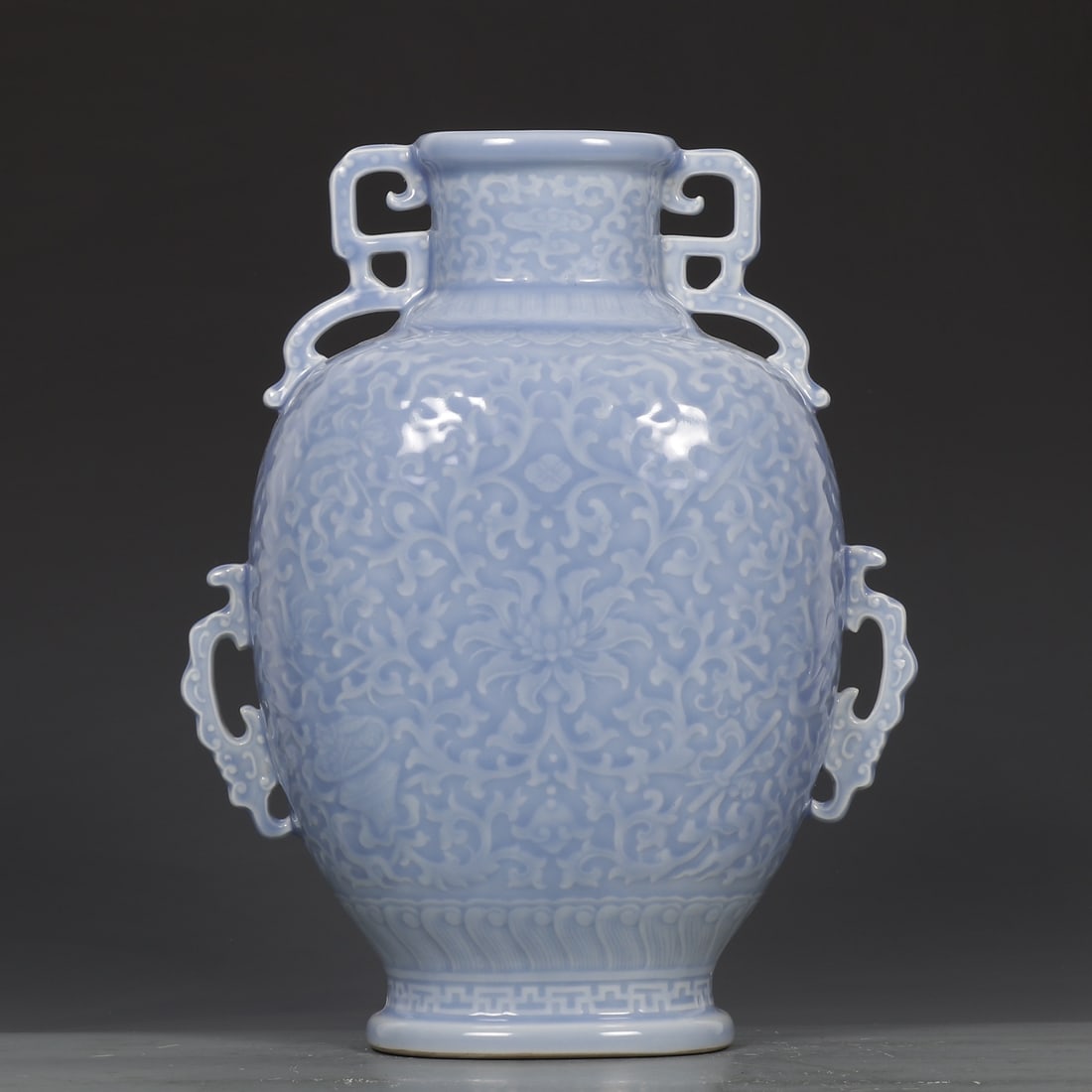 An Exquisite Sky Blue Glazed Lotus Pattern Vase: An Exquisite Sky Blue Glazed Lotus Pattern Vase,Qing Dynasty, China,Qianlong Six-character Mark,Size:11.4inx3.1inx9.1in 天青釉缠枝莲纹瓶,中国