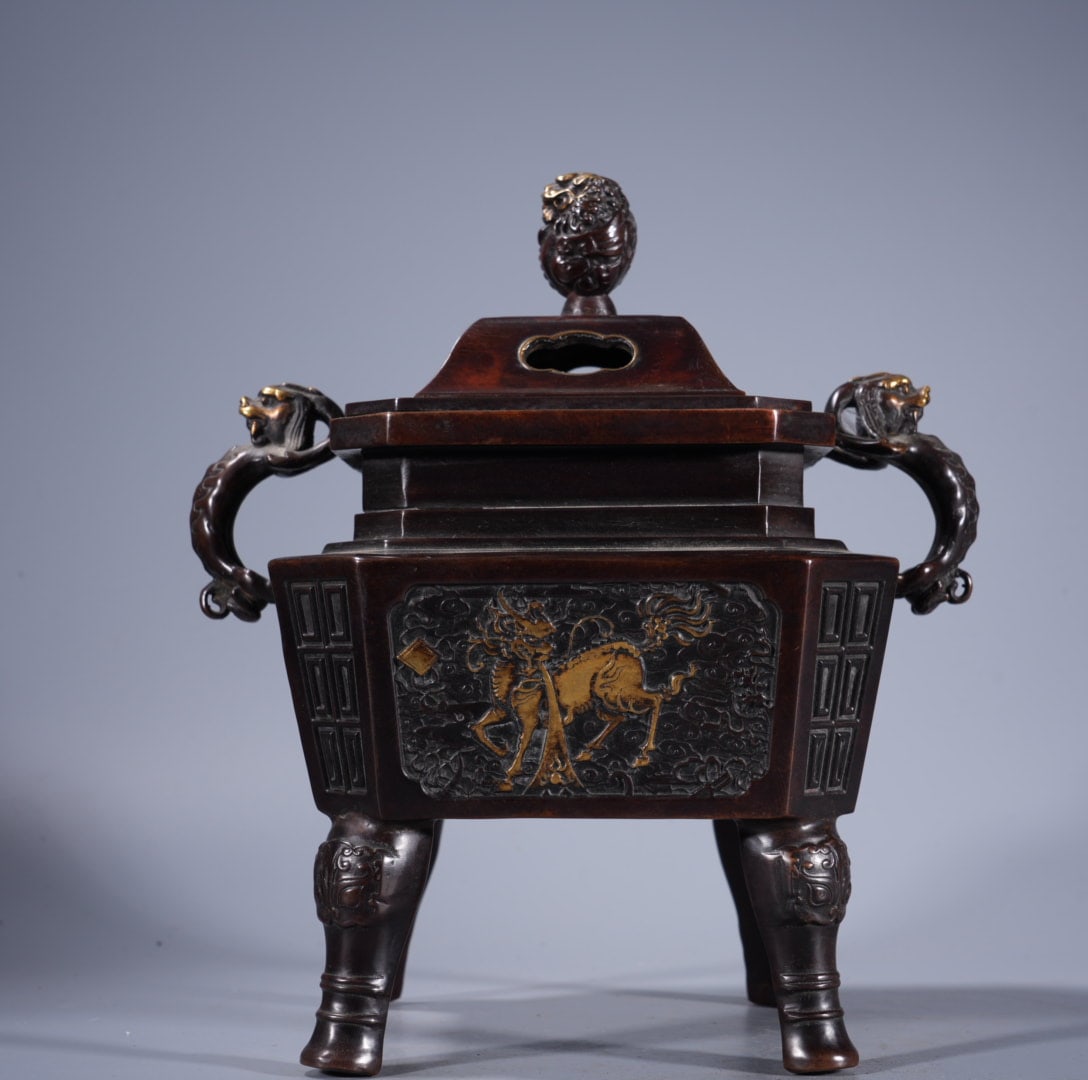 An Exquisite Gilt Bronze Relief Beast-Ears Censer: An Exquisite Gilt Bronze Relief Beast-Ears Censer,Ming Dynasty, China,Xuande Six-character Mark,Size:8.7inx4.9in ,Weight:3995g