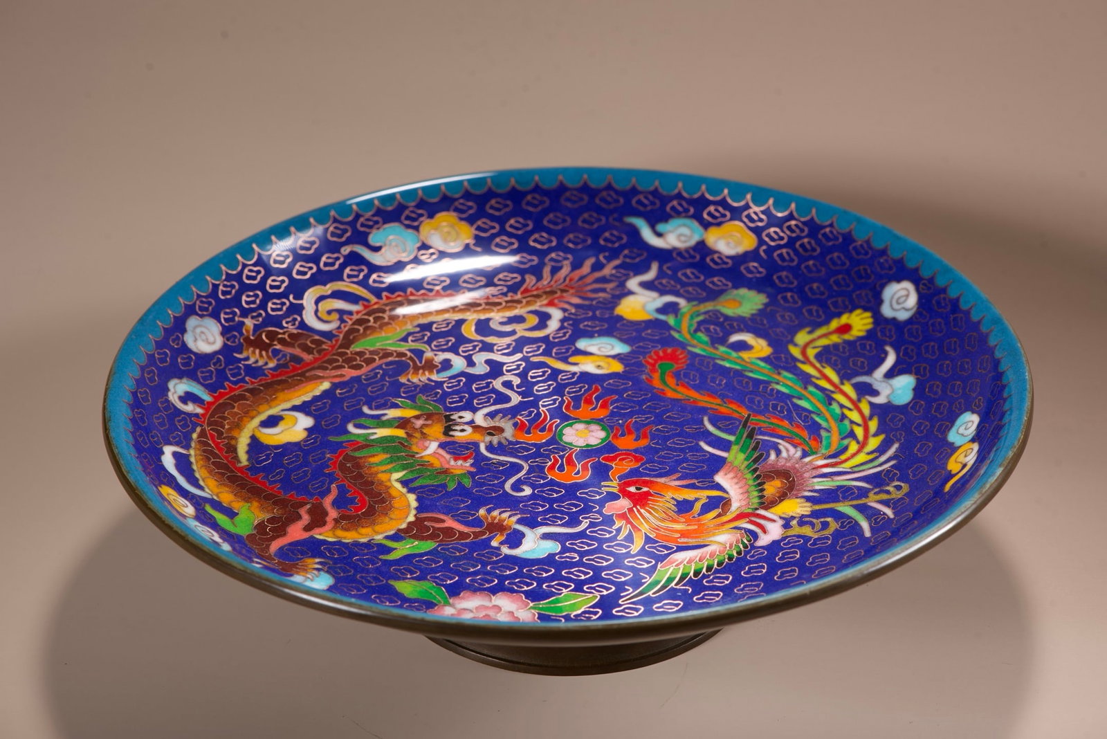 An Exquisite Cloisonne Dragon and Phoenix Pattern Plate: An Exquisite Cloisonne Dragon and Phoenix Pattern Plate,Qing Dynasty, China,Size:3.1inx11.8in ,Weight:1615g 景泰蓝龙凤纹盘,中国清代