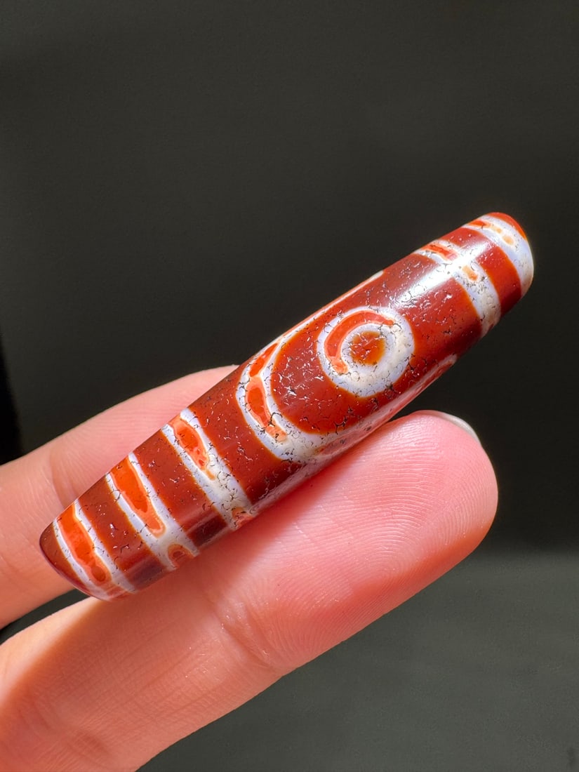 An Exquisite Ruyi Two-Eye Dzi bead: An Exquisite Ruyi Two-Eye Dzi bead,Qing Dynasty, China,Size:0.5inx2in 如意两眼天珠,中国清代