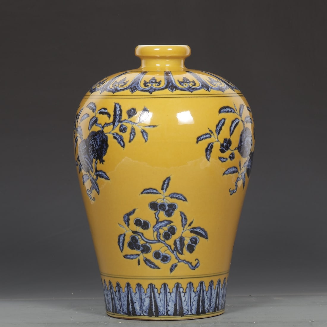 An Exquisite Yellow Ground Blue and White Flower and Fruit Pattern Vase: An Exquisite Yellow Ground Blue and White Flower and Fruit Pattern Vase,Ming Dynasty, China,Xuande Six-character Mark,Size:12.4inx2.4inx8.3in