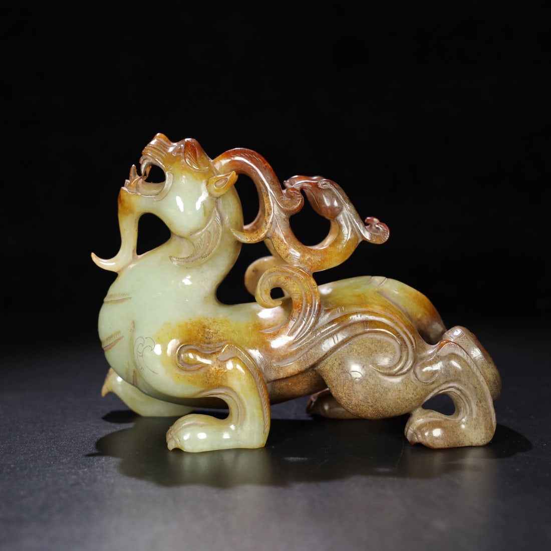 An Exquisite Hotan Jade Auspicious Beast: An Exquisite Hotan Jade Auspicious Beast,Han Dynasty, China,Size:6.3inx3inx4.6in,Weight:1027g 和田玉瑞兽,中国汉代