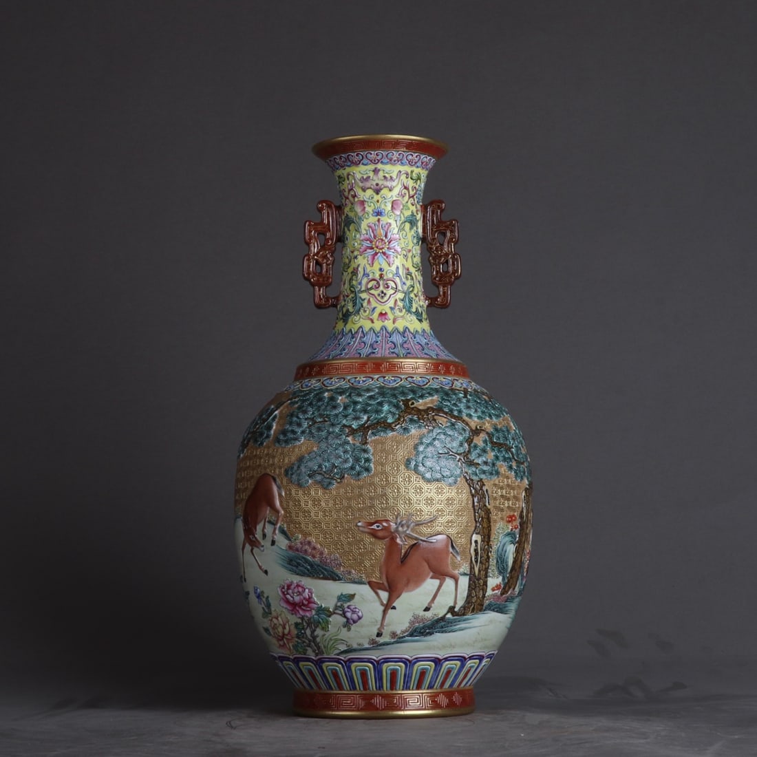 An Exquisite Famille-Rose Painted Gold Deer and Crane Pattern Double-Ears Vase: An Exquisite Famille-Rose Painted Gold Deer and Crane Pattern Double-Ears Vase,Qing Dynasty, China,Qianlong Six-character Mark,Size:13.6inx7.1in