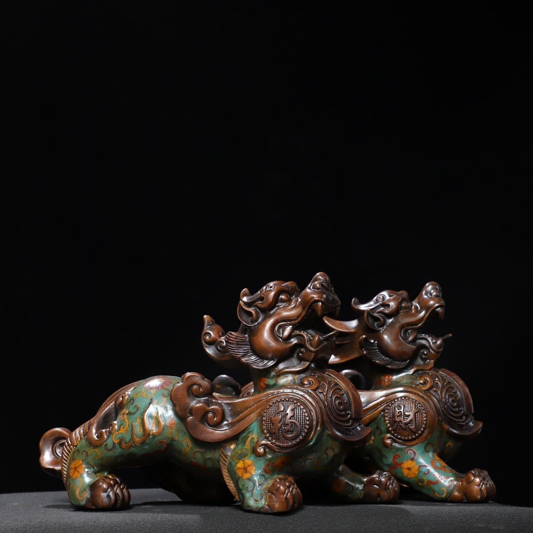 A pair of Exquisite Cloisonne Wire Inlaid Enamel Auspicious Beast Ornament: A pair of Exquisite Cloisonne Wire Inlaid Enamel Auspicious Beast Ornament,Ming Dynasty, China,Xuande Four-character Mark,Size:7.9inx12.6inx5.1in,Weight:7450g