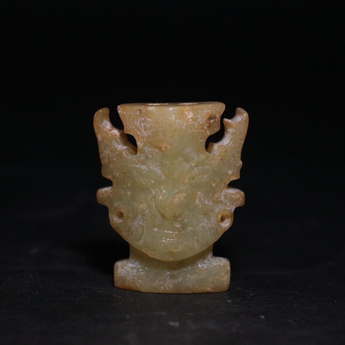 An Exquisite Gaogu Jade God-Human Face Jade pendant: An Exquisite Gaogu Jade God-Human Face Jade pendant,Ancient Time, China,Size:1.1inx0.4inx1.3in,Weight:13.5g 高古玉神人面佩,远古时期