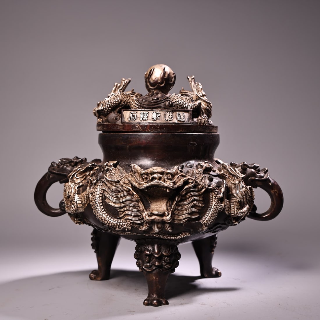 An Exquisite Silver-Gilt Bronze Dragon Pattern Censer: An Exquisite Silver-Gilt Bronze Dragon Pattern Censer,Ming Dynasty, China,Xuande Six-character Mark,Size:8.7inx10.2in,Weight:2650g 铜鎏银龙纹炉,中国