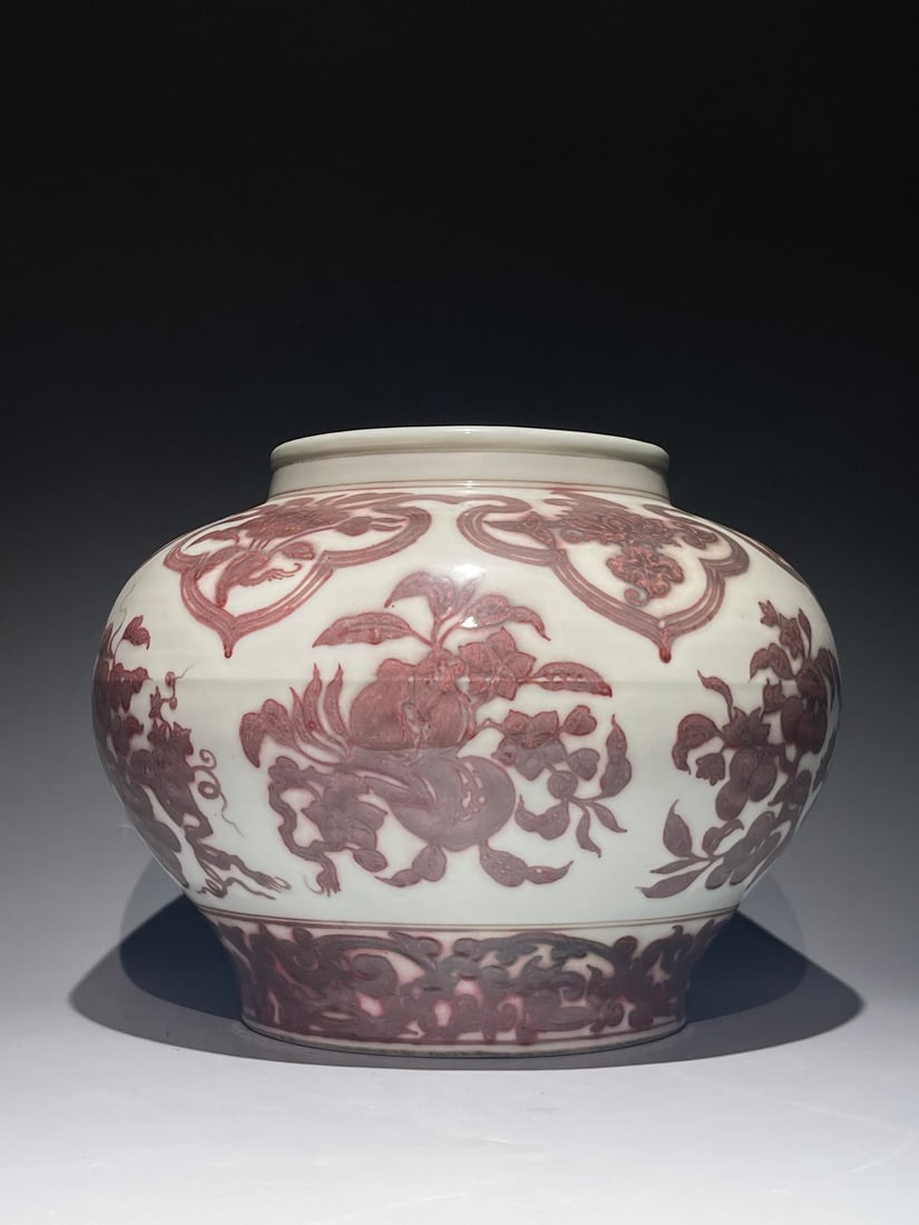 An Exquisite Underglaze-Red Melon and Fruit Pattern Jar: An Exquisite Underglaze-Red Melon and Fruit Pattern Jar,Ming Dynasty, China,Size:8.6inx11in 釉里红瓜果纹罐,中国明代