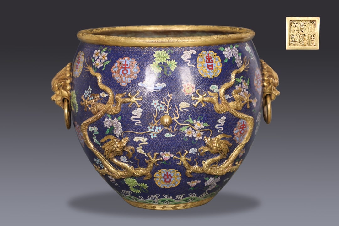 An Exquisite Copper Body Cloisonne Dragon Pattern Beast-Ears Vat: An Exquisite Copper Body Cloisonne Dragon Pattern Beast-Ears Vat,Qing Dynasty, China,Qianlong Six-character Mark,Size:13inx13.2inx16.7in,Weight:23450g 铜胎景泰蓝龙&
