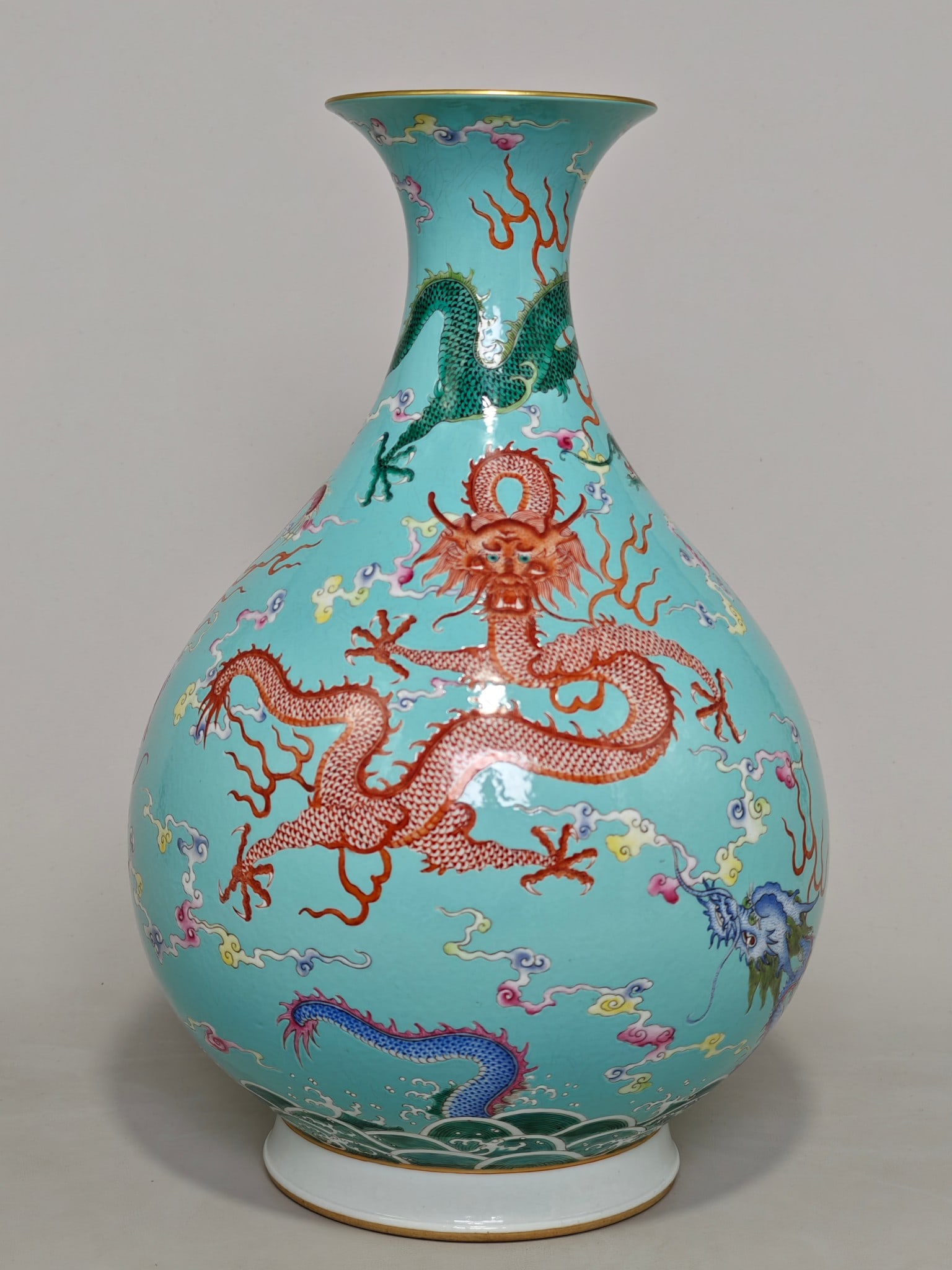 An Exquisite Turquoise Ground Famille-Rose Dragon Pattern Vase: An Exquisite Turquoise Ground Famille-Rose Dragon Pattern Vase,Qing Dynasty, China,Guangxu Six-character Mark,Size:14.8inx9.8in