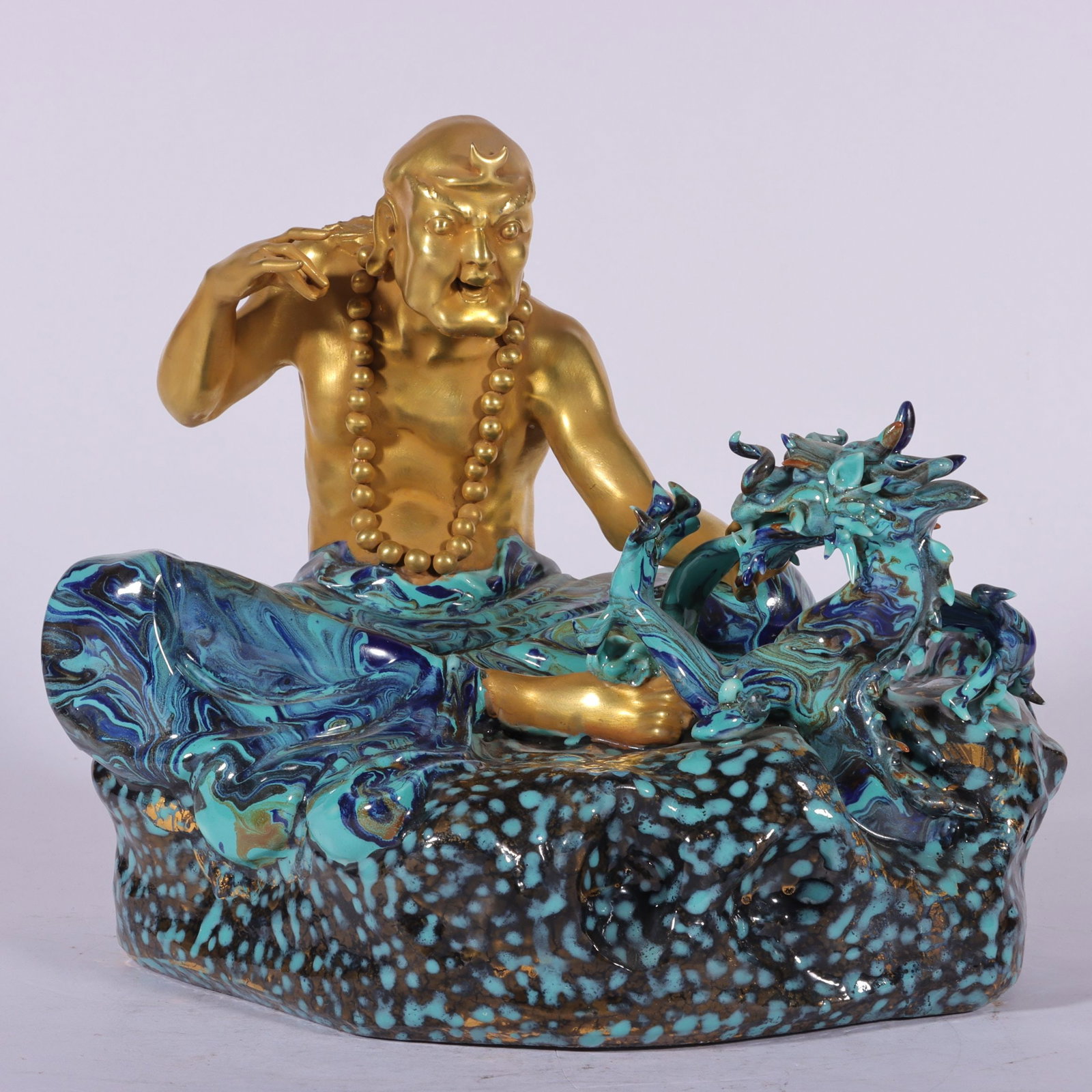 An Exquisite Robin's-Egg-Glazed Gold Overlaid Statue of Arhat: An Exquisite Robin's-Egg-Glazed Gold Overlaid Statue of Arhat,Qing Dynasty, China,Qianlong Six-character Mark,Size:8.7inx7.9in