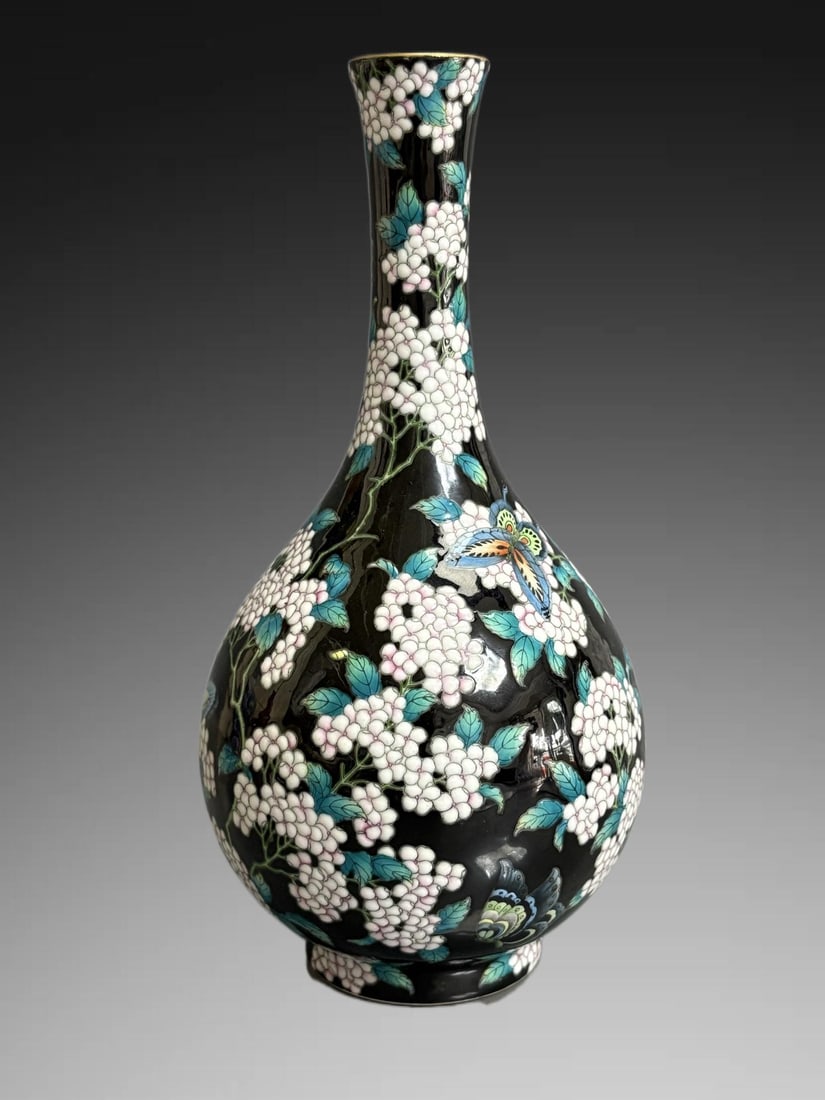 An Exquisite Famille-Rose Ink Color Ground Butterfly and Flower Pattern Vase: An Exquisite Famille-Rose Ink Color Ground Butterfly and Flower Pattern Vase,Qing Dynasty, China,Yongzhneg Four-character Mark,Size:7.9in×4.1in