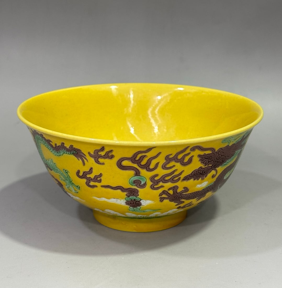 An Exquisite Yellow Glazed Dragon Pattern Bowl: An Exquisite Yellow Glazed Dragon Pattern Bowl,Qing Dynasty, China,Qianlong Six-character Mark,Size:2.8inx5.9in