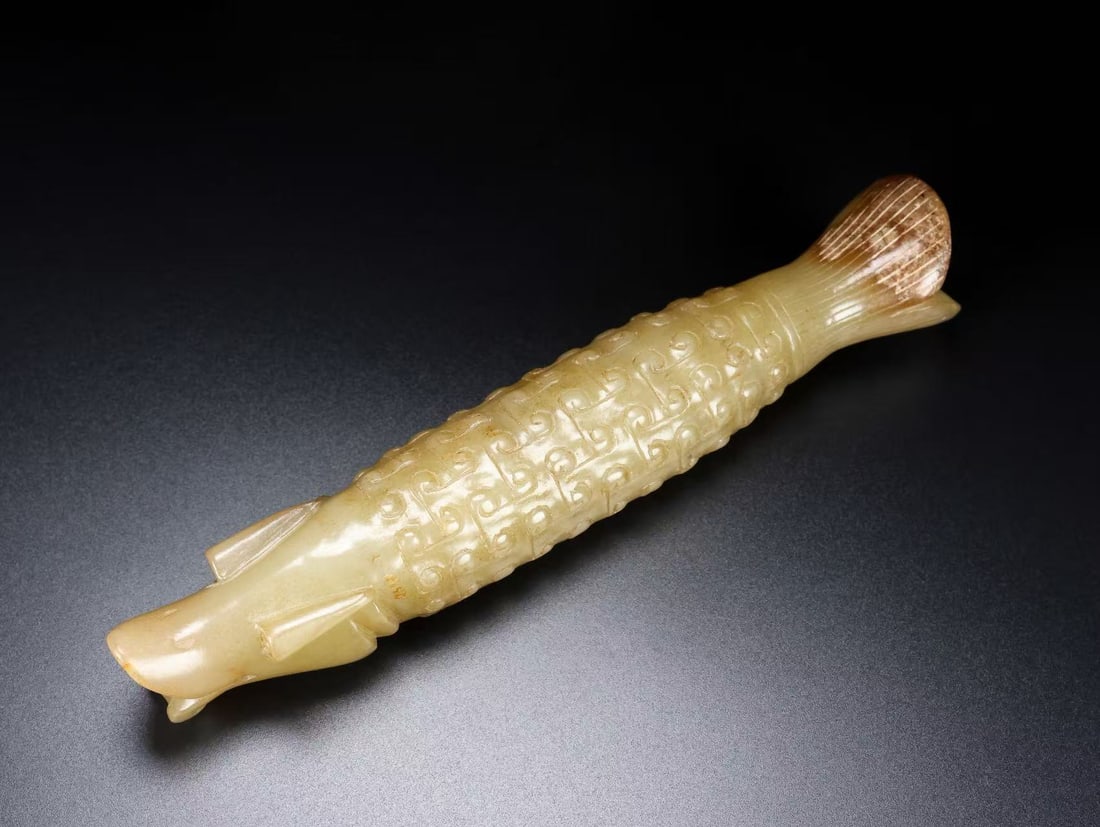 An Exquisite Hotan Jade Fish: An Exquisite Hotan Jade Fish,Han Dynasty, China,Size:2.4inx1.2in,Weight:180g 和田玉鱼,中国汉代