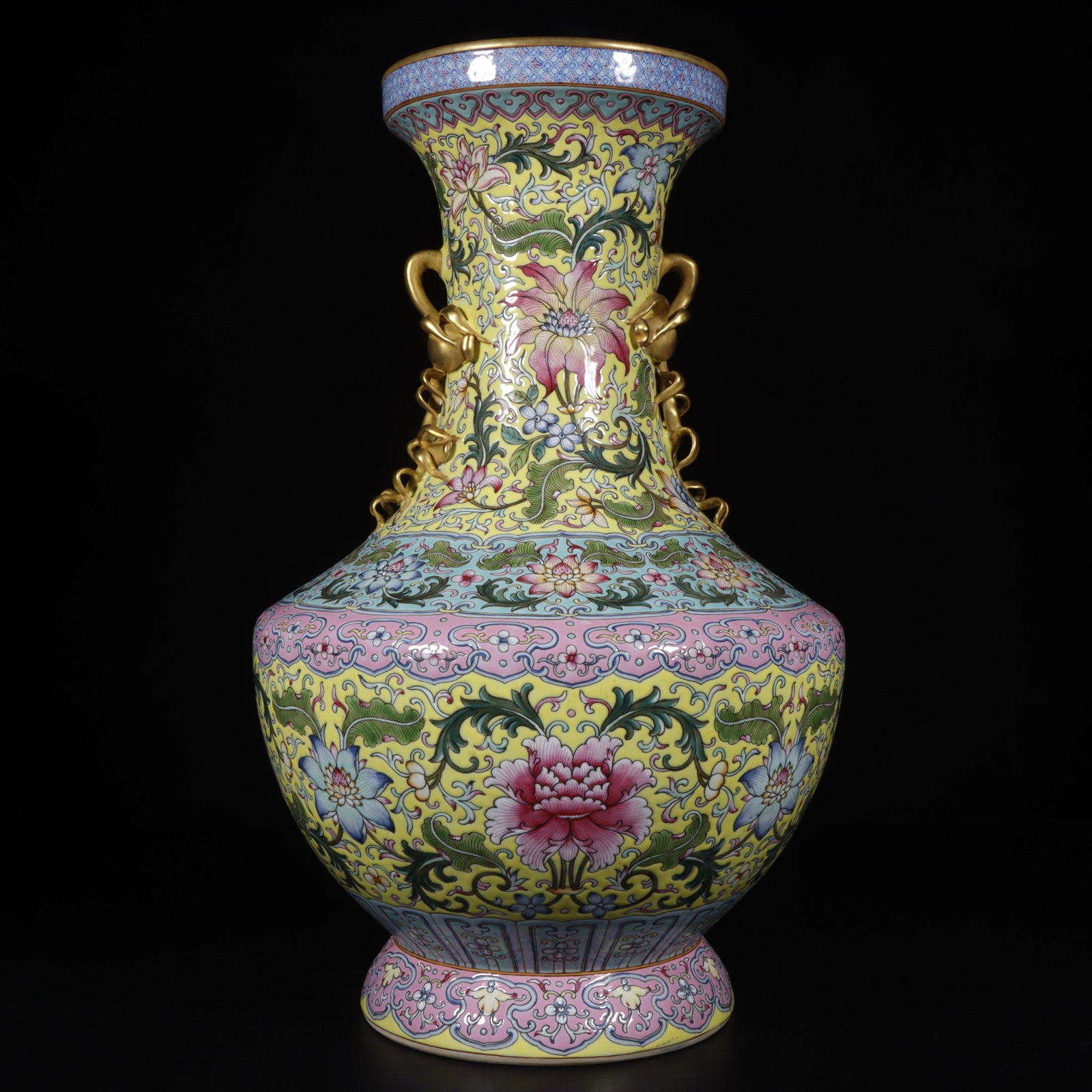 An Exquisite Famille-Rose Yellow Ground Lotus Pattern Double-Ears Vase: An Exquisite Famille-Rose Yellow Ground Lotus Pattern Double-Ears Vase,Qing Dynasty, China,Qianlong Four-character Mark,Size:15.5inx5.7inx6.2in 粉彩黄地缠枝莲