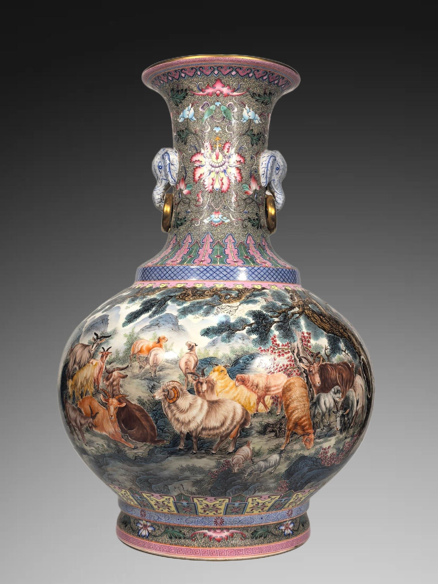 An Exquisite Enamel Sheep Pattern Elephant-Ears Vase: An Exquisite Enamel Sheep Pattern Elephant-Ears Vase,Qing Dynasty, China,Qianlong Four-character Mark,Size:21.7inx14.2in 珐琅彩羊纹象耳瓶,中ࢲ