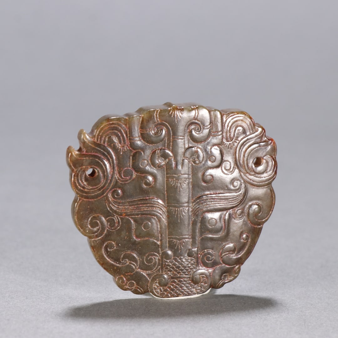 An Exquisite Hotan Jade Beast-Face Pattern Pendant: An Exquisite Hotan Jade Beast-Face Pattern Pendant,Han Dynasty, China,Size:1.9inx2.1in,Weight:36.6g 和田玉兽面纹佩,中国汉代