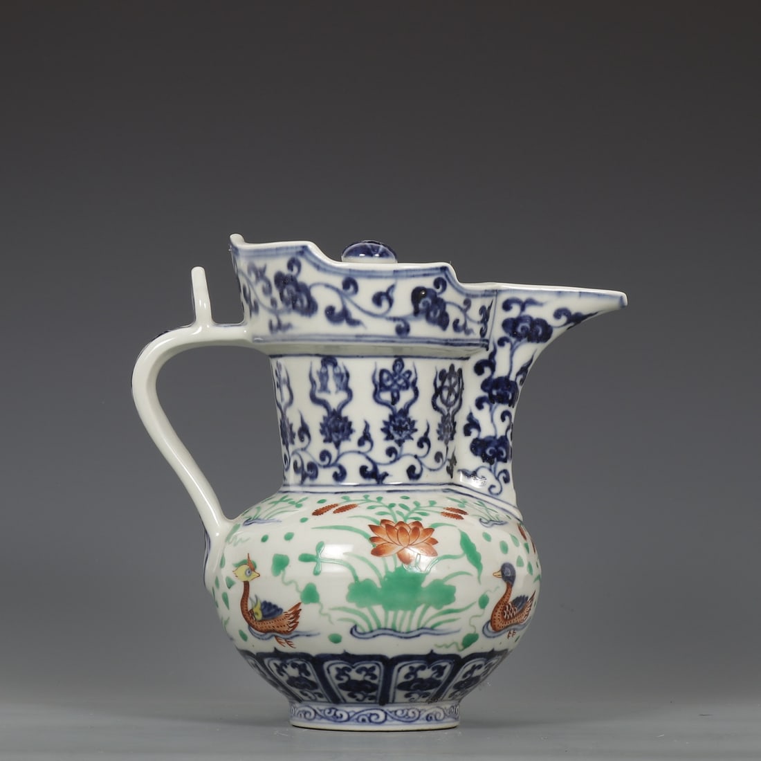 An Exquisite Wucai Flower and Bird Pattern Ewer: An Exquisite Wucai Flower and Bird Pattern Ewer,Ming Dynasty, China,Size:9.8inx8.1inx6.7in 五彩花鸟纹壶,中国明代