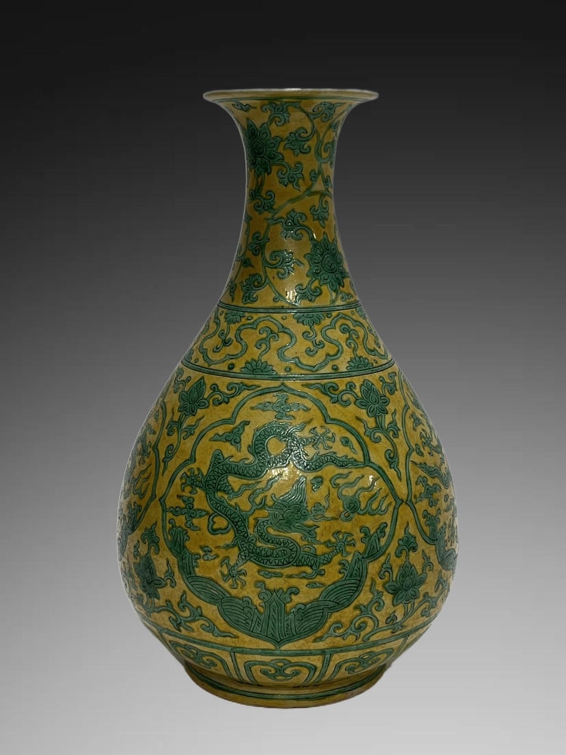 An Exquisite Yellow Ground Green Color Dragon Pattern Vase: An Exquisite Yellow Ground Green Color Dragon Pattern Vase,Ming Dynasty, China,Jiajing Six-character Mark,Size:12.2in 黄地绿彩龙纹瓶,中国明&