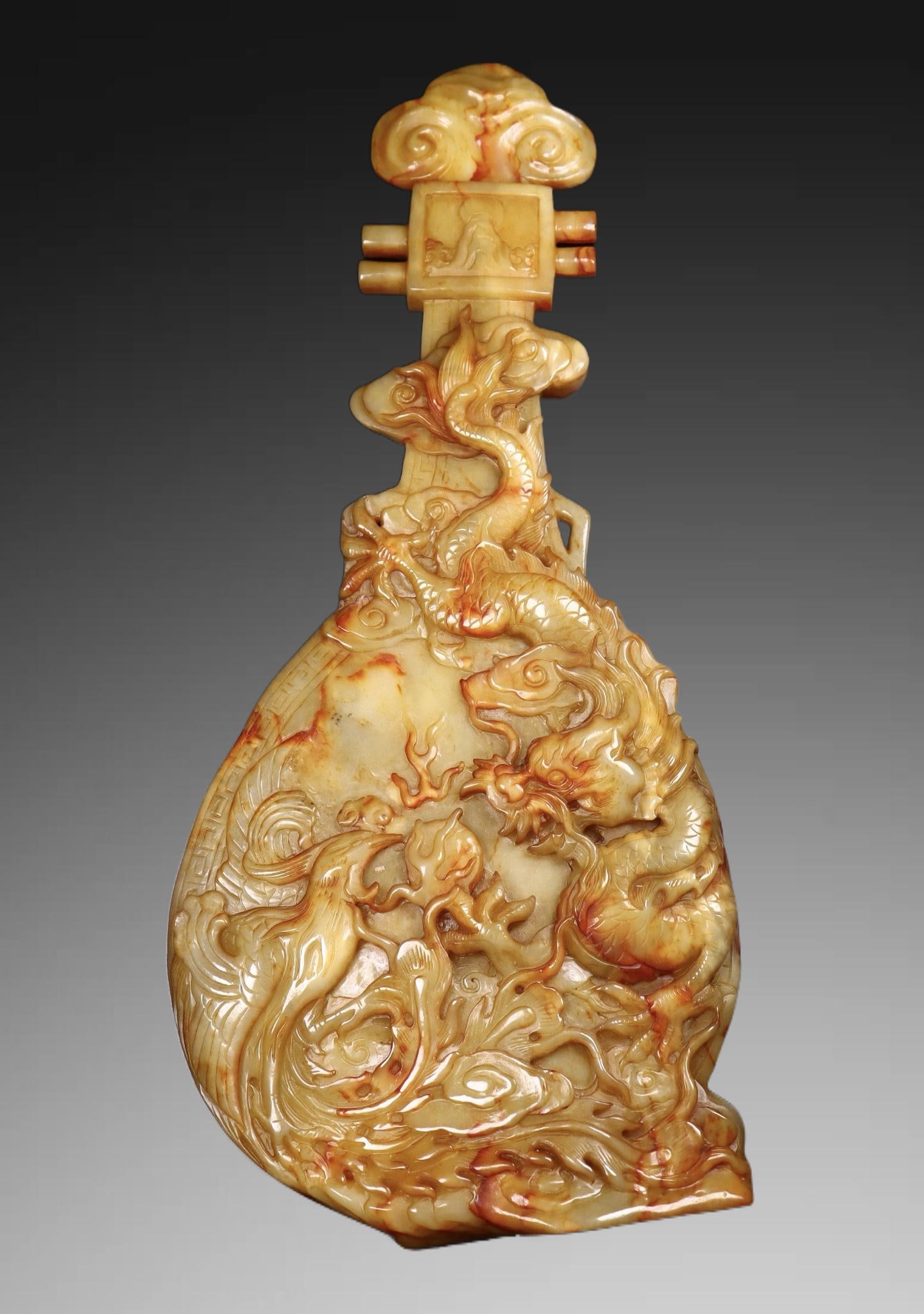An Exquisite Hotan Jade Dragon and Phoenix Pattern Pipa: An Exquisite Hotan Jade Dragon and Phoenix Pattern Pipa,Qing Dynasty, China,Size:15.7inx6.9inx0.8in,Weight:1525g