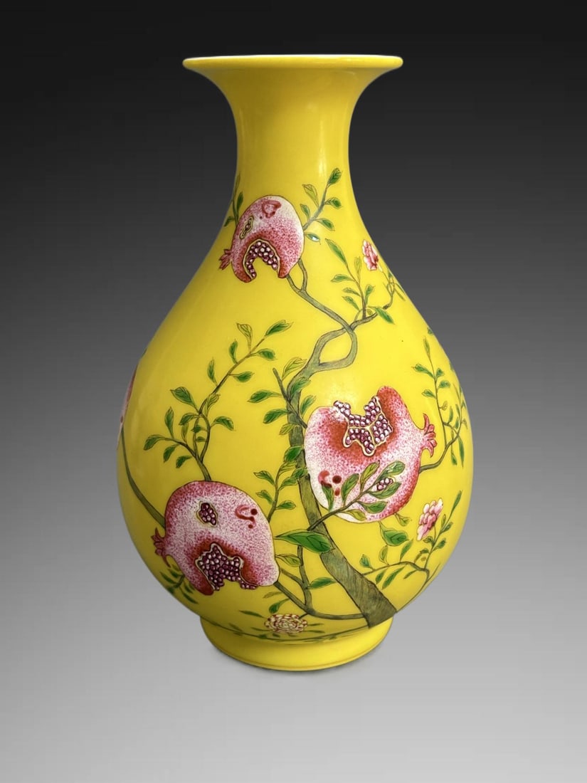 An Exquisite Famille-Rose Yellow Ground Pomegranate Pattern Vase: An Exquisite Famille-Rose Yellow Ground Pomegranate Pattern Vase,Qing Dynasty, China,Qianlong Six-character Mark,Size:7.9in×4.9in