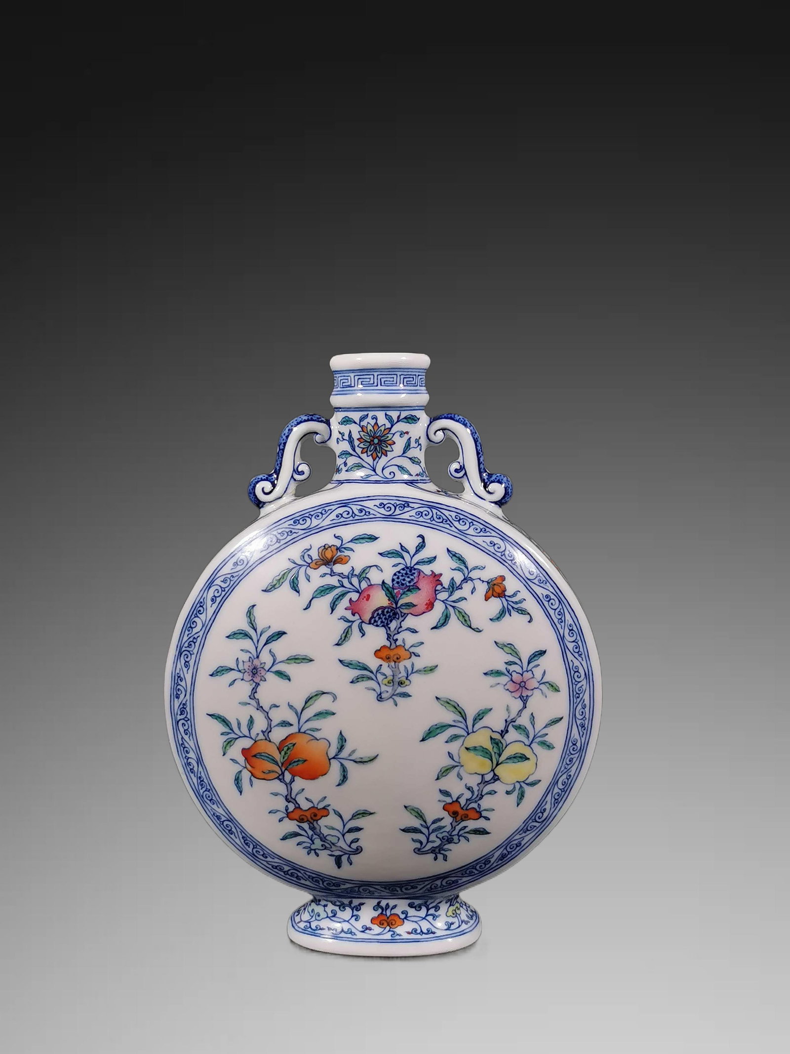 An Exquisite Blue and White Doucai Flower and Fruit Pattern Vase: An Exquisite Blue and White Doucai Flower and Fruit Pattern Vase,Qing Dynasty, China,Yongzheng Six-character Mark,Size:9.8inx6.9in 青花斗彩花果纹瓶,