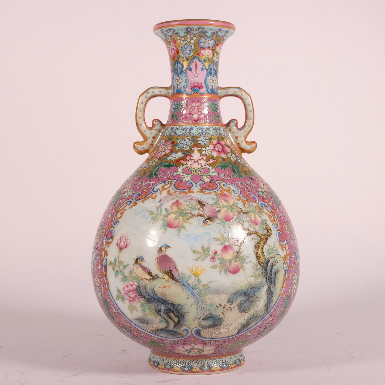 An Exquisite Enamel Ruby Red-Ground Flower and Bird Pattern Double-Ears Vase: An Exquisite Enamel Ruby Red-Ground Flower and Bird Pattern Double-Ears Vase,Qing Dynasty, China,Qianlong Four-character Mark,Size:9.8inx2.3inx5.5inx2.8in 珐琅彩胭脂ń