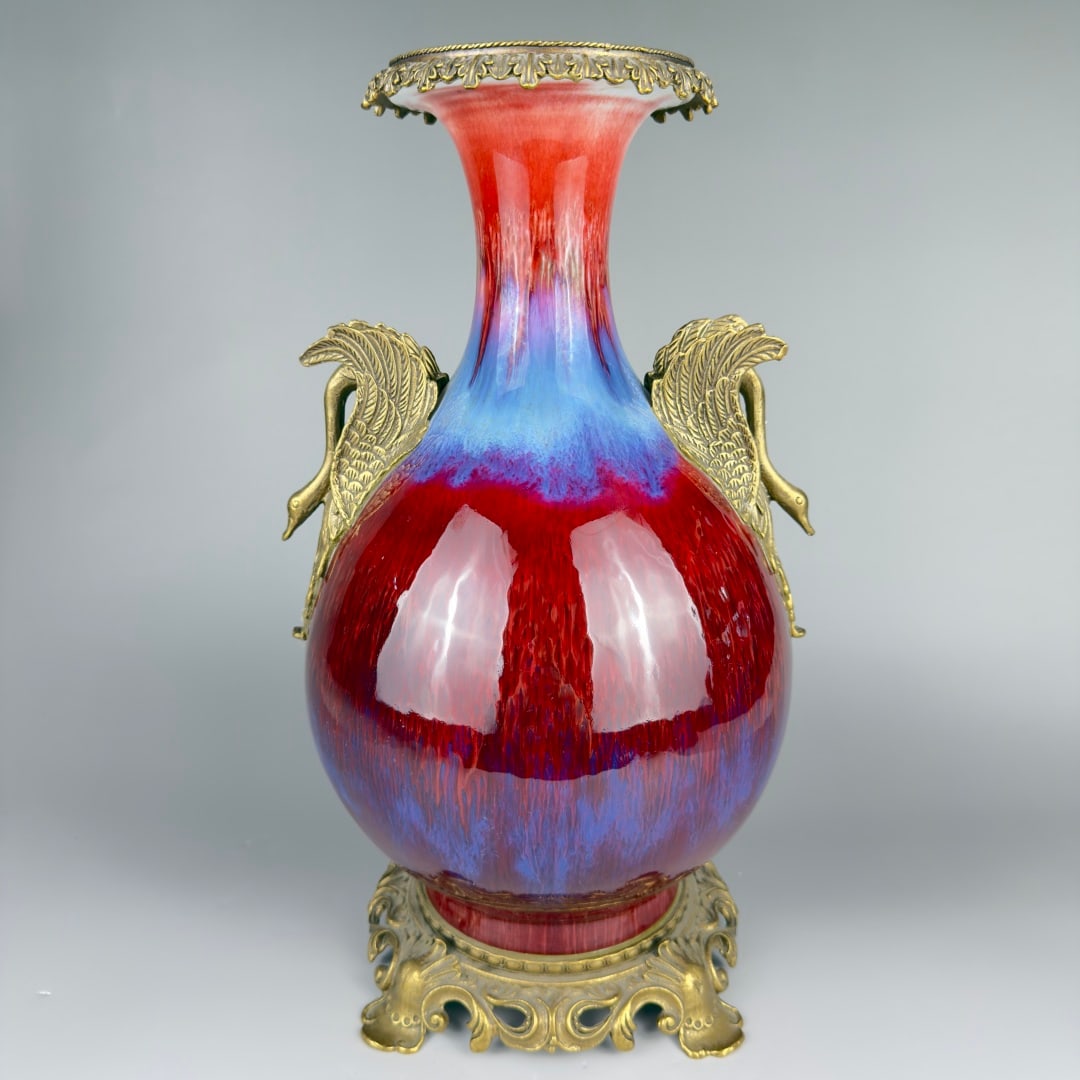 An Exquisite Flambe Glazed Copper-Inlaid Goose-Ears Vase: An Exquisite Flambe Glazed Copper-Inlaid Goose-Ears Vase,Qing Dynasty, China,Qianlong Six-character Mark,Size:18.1inx6.3inx9.8inx7.9in 窑变釉镶铜鹅耳瓶,