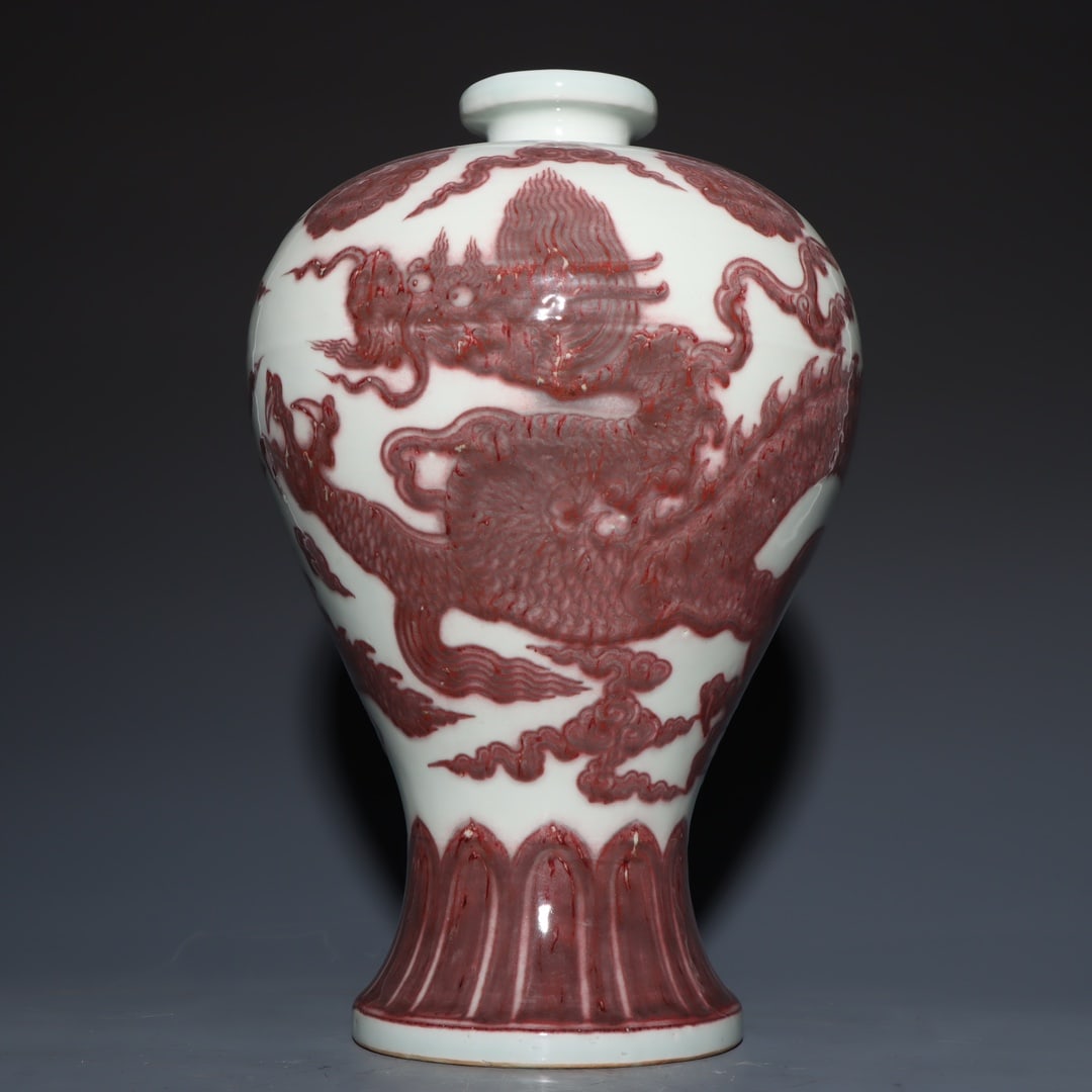 An Exquisite Underglaze-Red Dragon Pattern Vase: An Exquisite Underglaze-Red Dragon Pattern Vase,Ming Dynasty, China,Xuande Four-character Mark,Size:15.7inx3.3inx10.2inx6.3in