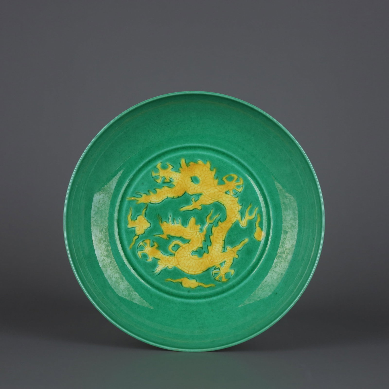 An Exquisite Tri-Color Glazed Dragon Pattern Plate: An Exquisite Tri-Color Glazed Dragon Pattern Plate,Ming Dynasty, China,Hongzhi Six-character Mark,Size:1.4inx5.9in