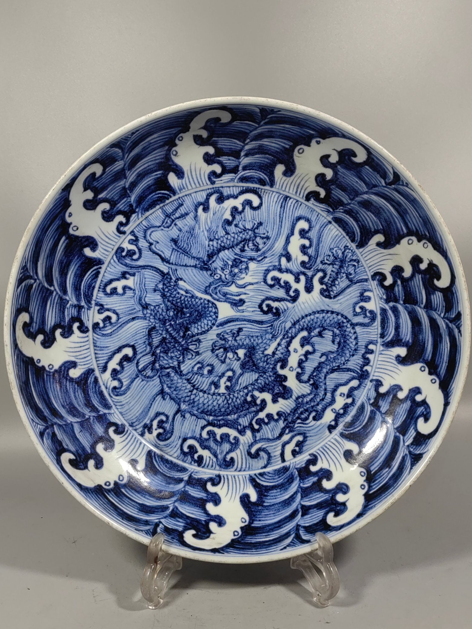 An Exquisite Blue and White Dragon Pattern Plate: An Exquisite Blue and White Dragon Pattern Plate,Ming Dynasty, China,With Mark,Size:2.8inx12.7in 青花龙纹盘,中国明代,带款
