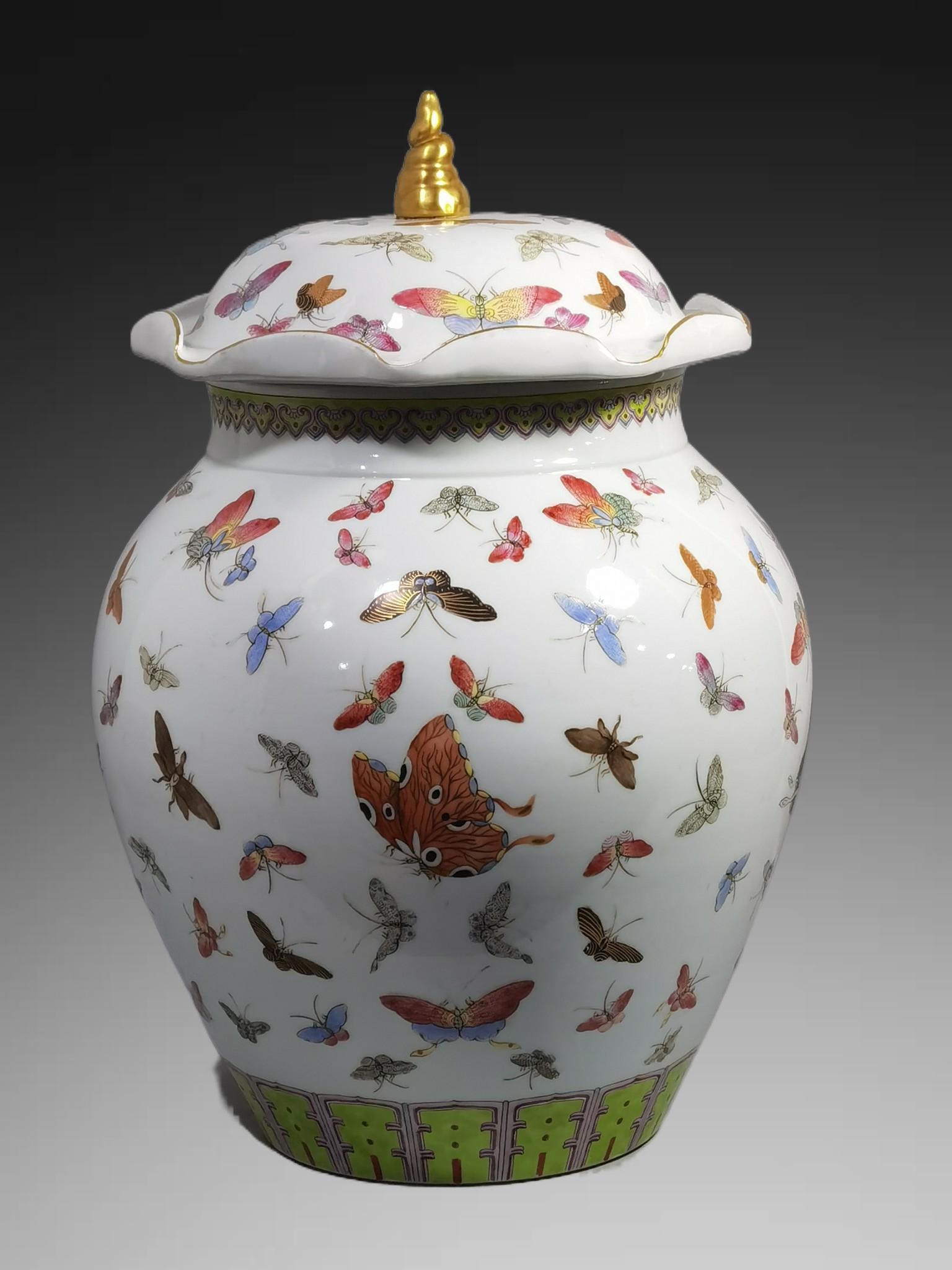 An Exquisite Famille-Rose Butterfly Pattern Jar: An Exquisite Famille-Rose Butterfly Pattern Jar,Qing Dynasty, China,Guangxu Six‑character Mark,Size:15.6inx7.1inx10.6in