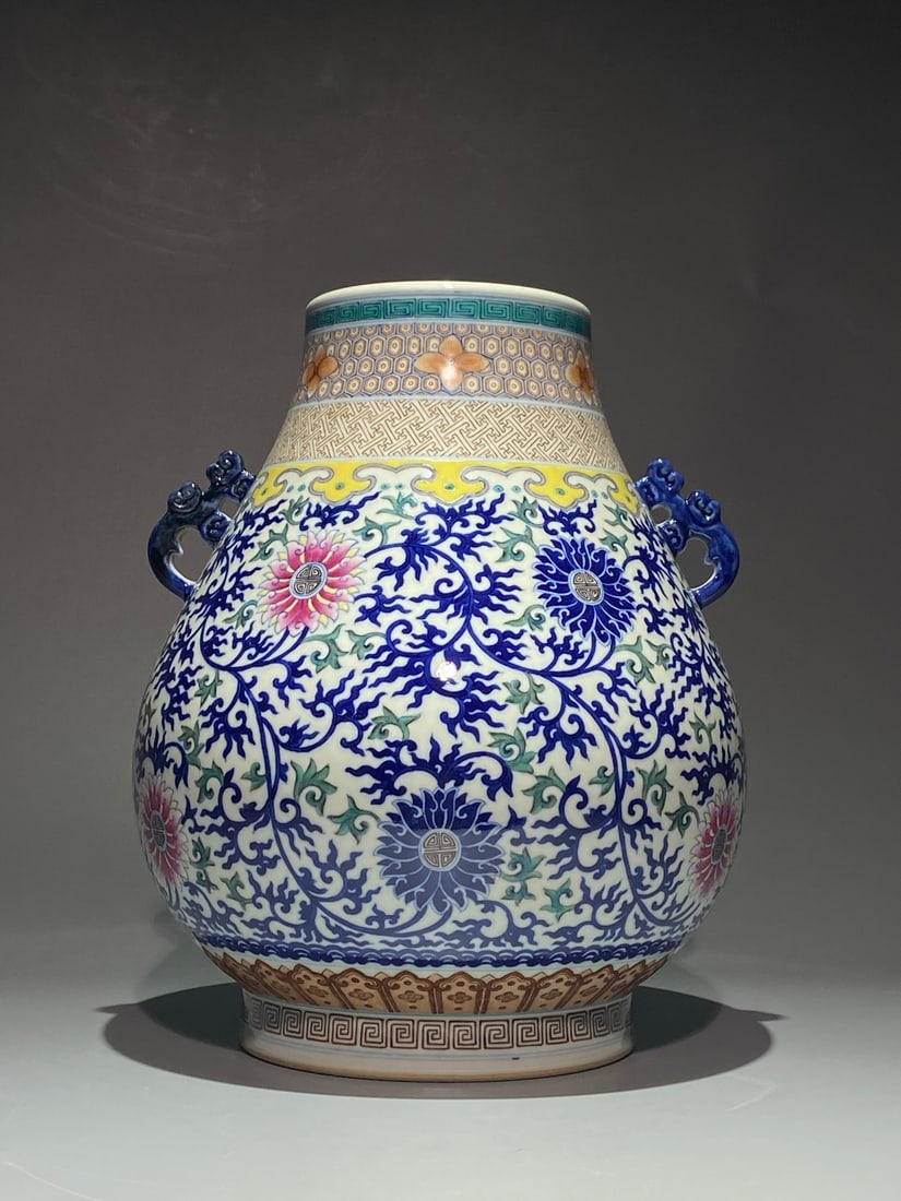 An Exquisite Blue and White Lotus Pattern Double-Ears Vase: An Exquisite Blue and White Lotus Pattern Double-Ears Vase,Qing Dynasty, China,Qianlong Six-character Mark,Size:13.4inx11in