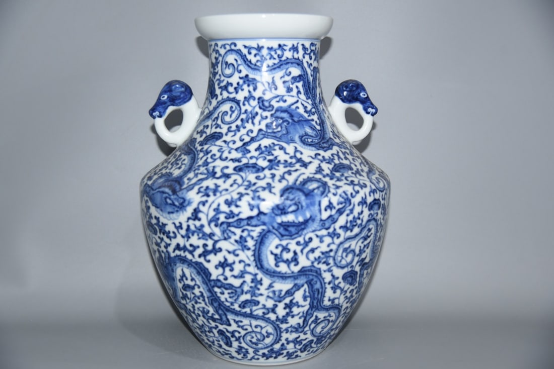 An Exquisite Blue and White Dragon Pattern Beast-Ears Vase: An Exquisite Blue and White Dragon Pattern Beast-Ears Vase,Qing Dynasty, China,Qianlong Six-character Mark,Size:14.6inx10.2in 青花龙纹兽耳瓶,中国&