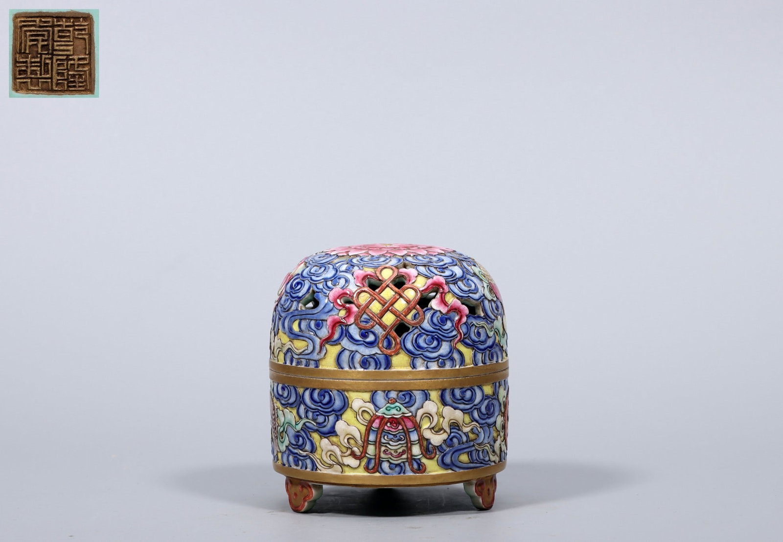An Exquisite Famille-Rose Auspicious Cloud and Eight Treasures Pattern Tripod Censer: An Exquisite Famille-Rose Auspicious Cloud and Eight Treasures Pattern Tripod Censer,Qing Dynasty, China,Qianlong Four-character Mark,Size:3.3inx3.1inx2.8inx3.1in