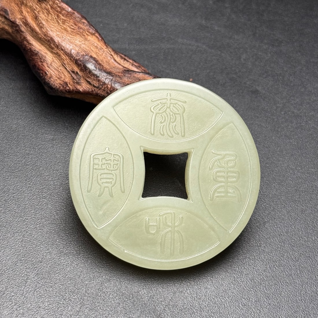 An Exquisite Hotan Jade Square Hole Coin Jade Pendant: An Exquisite Hotan Jade Square Hole Coin Jade Pendant,Qing Dynasty,China,Size:2inx0.2in,Weight:33g 和田玉方孔钱币佩,中国清代