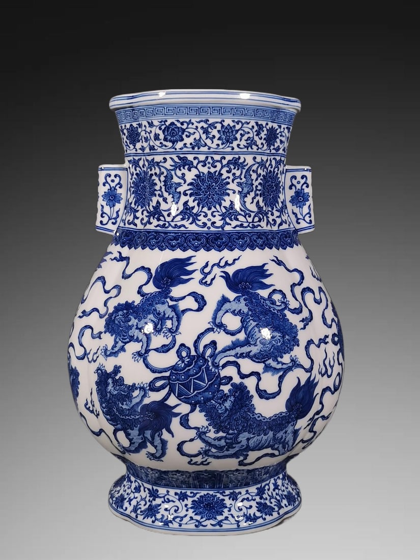 An Exquisite Blue and White Lotus Pattern Lion Pattern Double-Ears Vase: An Exquisite Blue and White Lotus Pattern Lion Pattern Double-Ears Vase,Qing Dynasty, China,Qianlong Six-character Mark,Size:17.1inx7.7inx11.4in