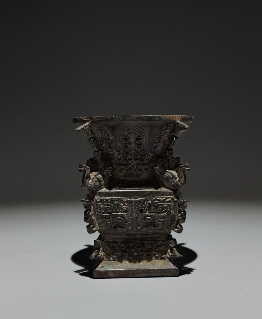 An Exquisite Bronze Taotie Pattern Elephant‑Shaped Vase: An Exquisite Bronze Taotie Pattern Elephant‑Shaped Vase,Han Dynasty, China,Size:4.1inx3.3in 青铜饕餮纹象形瓶,中国汉代